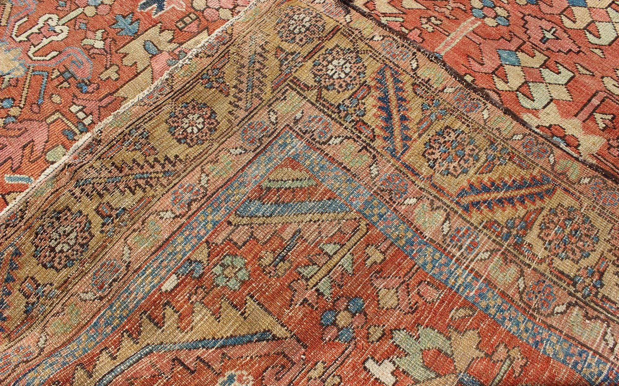 19th Century Antique All-Over Persian Heriz Rug in Faded Rust and Gold Colors