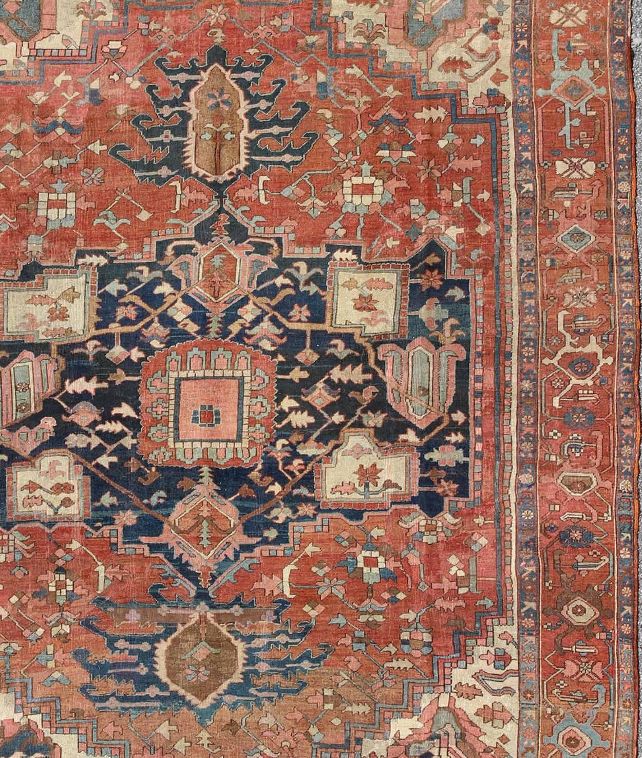 Hand-Knotted Antique Persian Serapi Rug With Medallion in Rusty-Orange, Blue and Cream's  For Sale