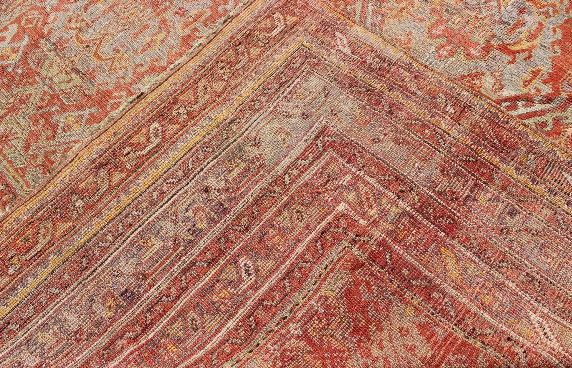 Antique Turkish Oushak Rug with Geometric Design in Soft Red, Light Blue, Yellow For Sale 1