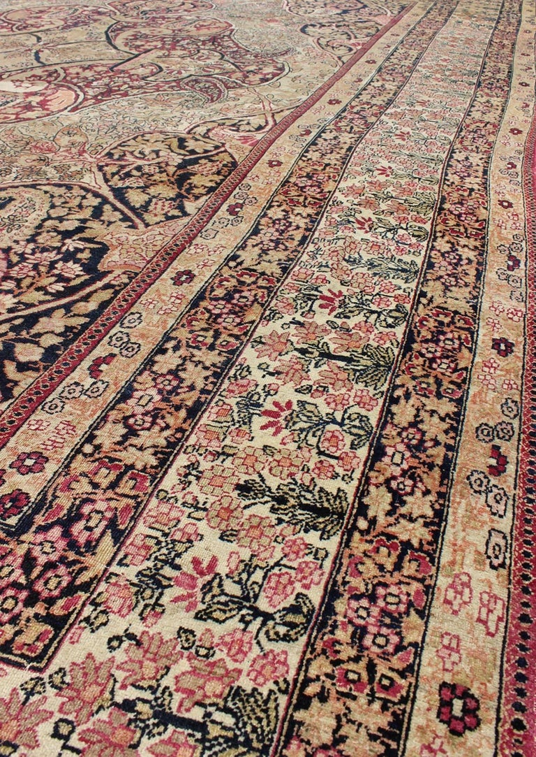 Antique Persian Lavar Kerman Rug with Floral Medallion For Sale at