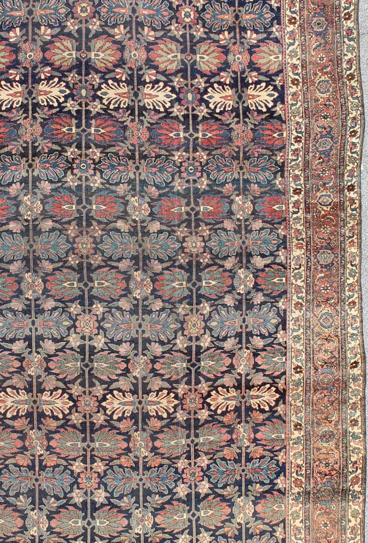 Large Antique Persian Bidjar Rug in Blue Background and Floral Pattern In Good Condition In Atlanta, GA