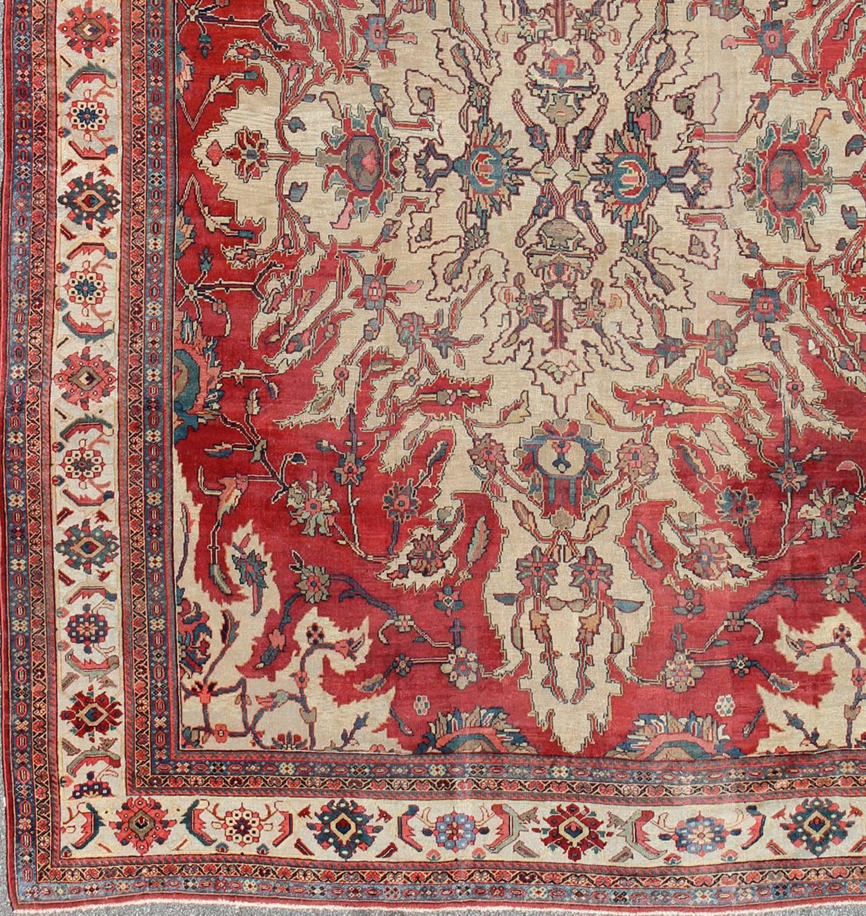 Large Antique Persian Sultanabad rug, rug E-1209, country of origin / type: Iran / Sultanabad, circa Early-20th Century.

Measures: 12'2 x 16'

This beautiful antique Persian Sultanabad carpet draws from nature's designs for its inspiration. The