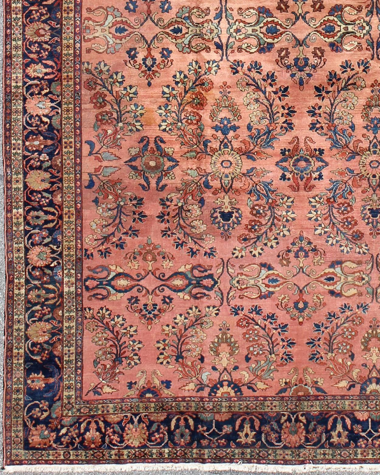 Antique Persian Lilihan Large rug in Salmon, Pink, Blue, Green and Rust Colors. Keivan Woven Arts / rug Lh-A38502, country of origin / type: Iran / Lilihan, circa 1900. , Antique Persian Large Lilihan.
Measures: 11'1 x 17'2
This immaculately woven
