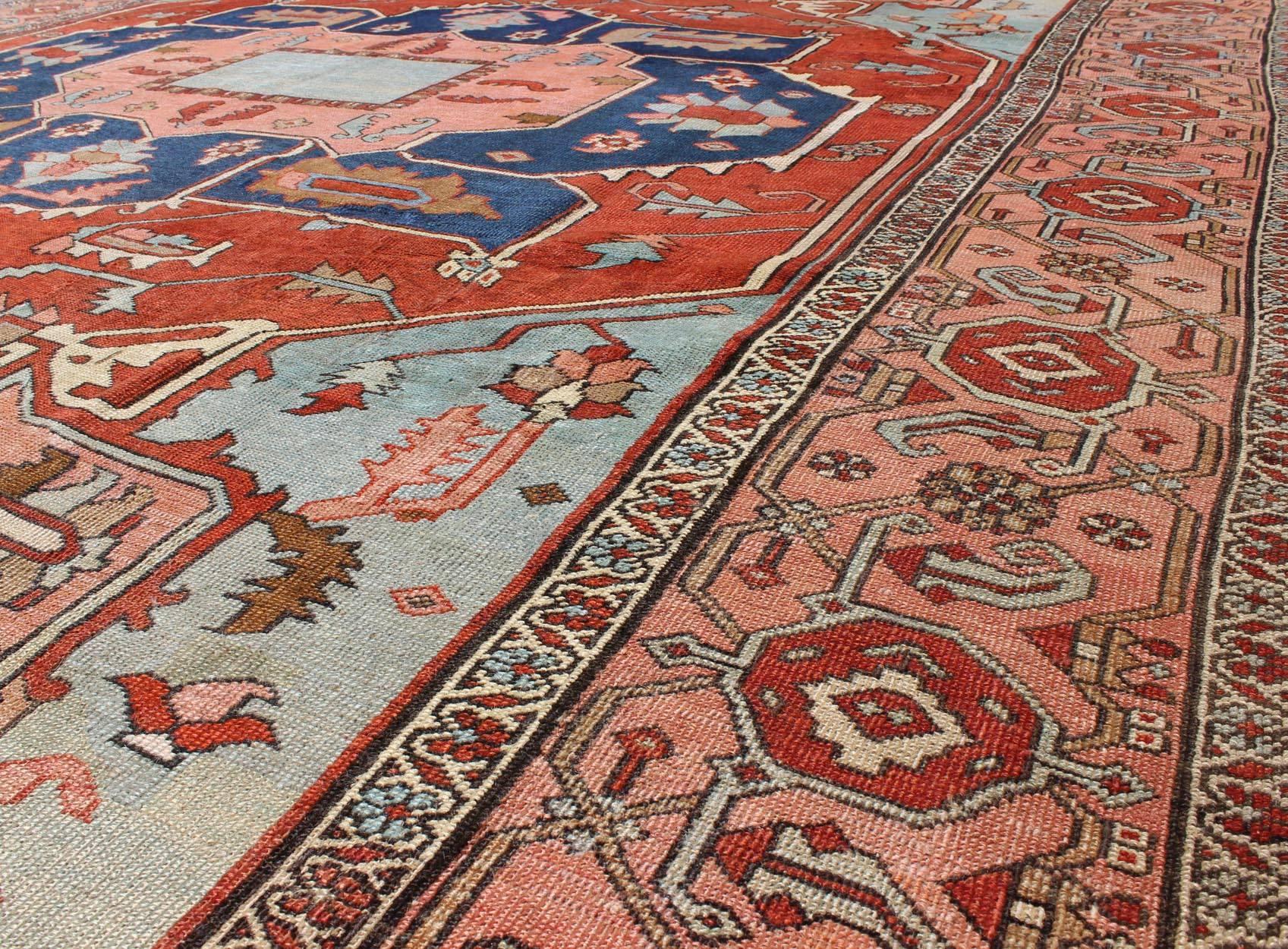 Hand-Knotted Antique Persian Serapi Carpet with Arabesque Detail and Vine-Scroll Border For Sale