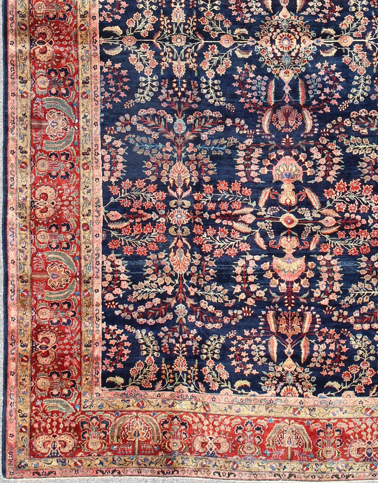 Antique Persian Sarouk Ferahan rug in blue background.
Antique Persian Finely Woven Sarouk Ferahan rug with intricate details in navy blue background and red border. rug / D-0921
This finely woven antique Persian Sarouk Feraghan carpet is rich in
