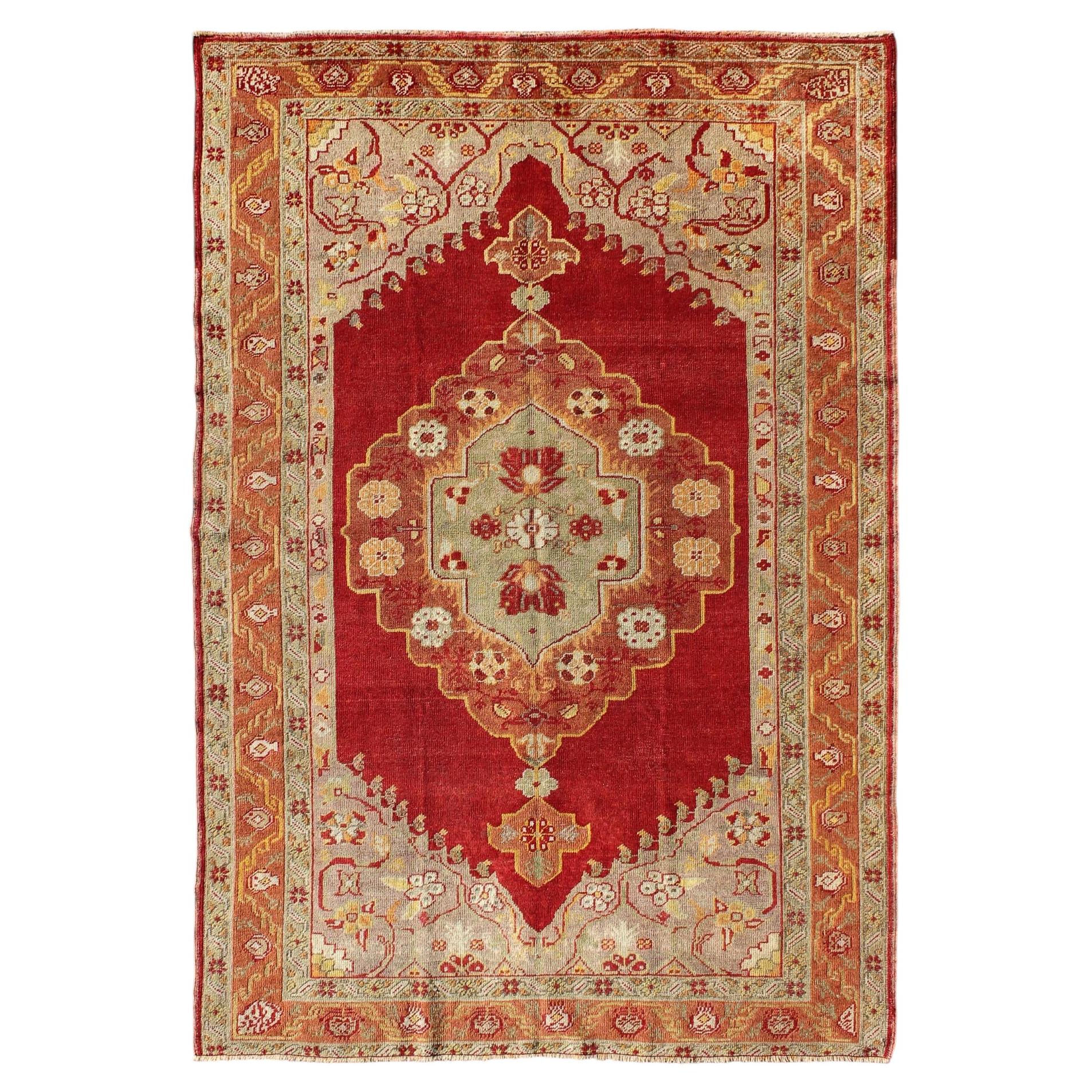 Early 20th Century Antique Turkish Oushak Rug With Stretched Floral Medallion