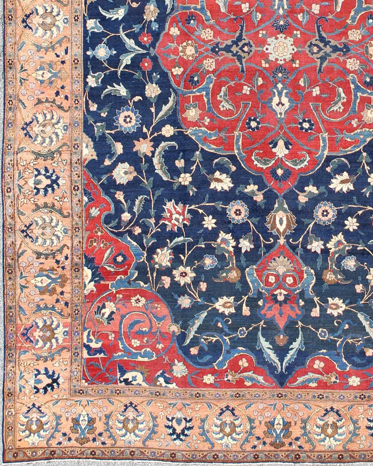 Antique Large Persian Tabriz Rug with Large Flowers On A Navy Background. Antique Persian Tabriz. Keivan Woven Arts / rug HAS-711, country of origin / type: Persian / Tabriz, circa Early-20th Century.

Measures: 13'0'' x 17'6''.

This antique