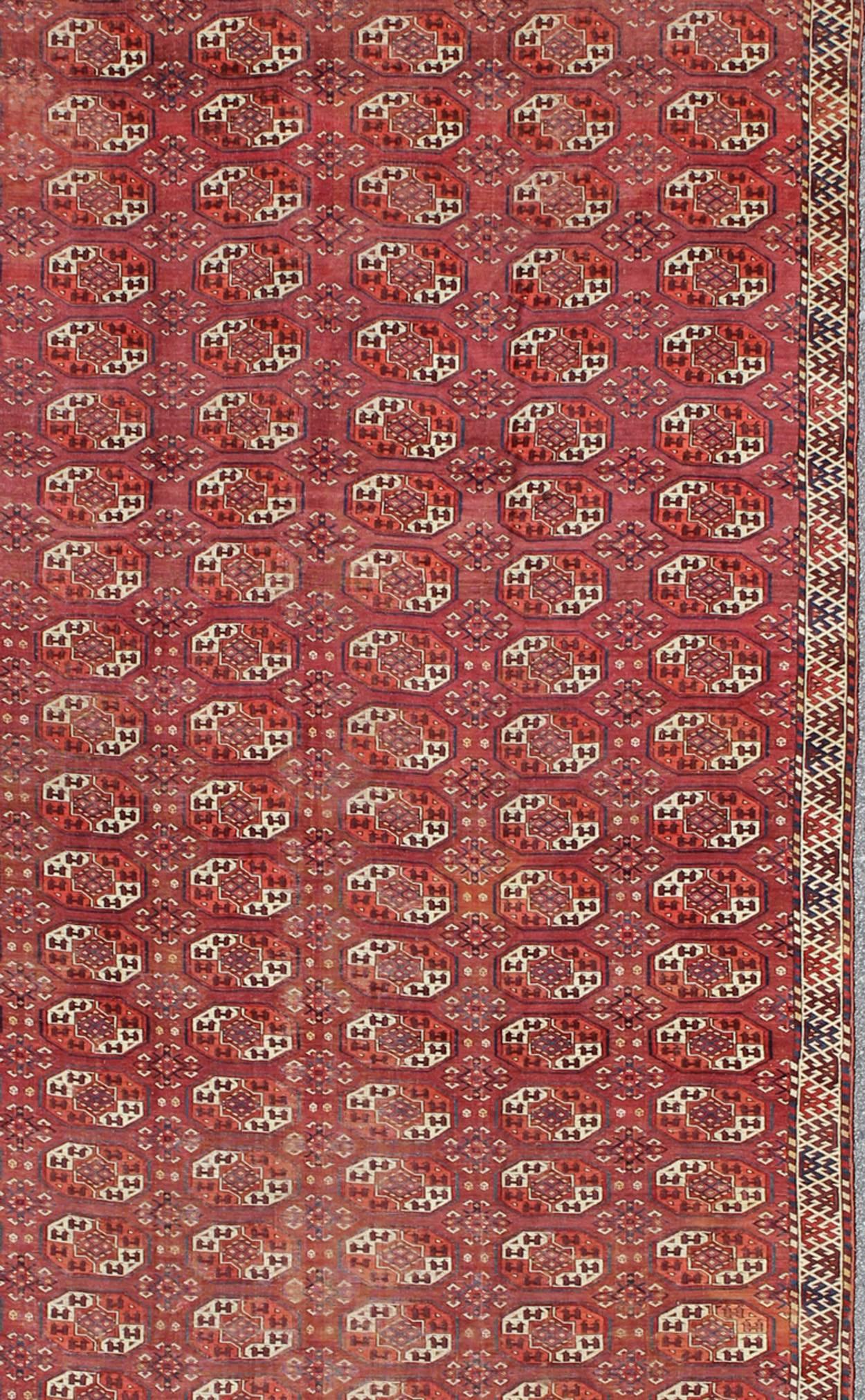Turkestan Extremely Large Antique Tekke Rug with Red Field and Repeating Medallion Design