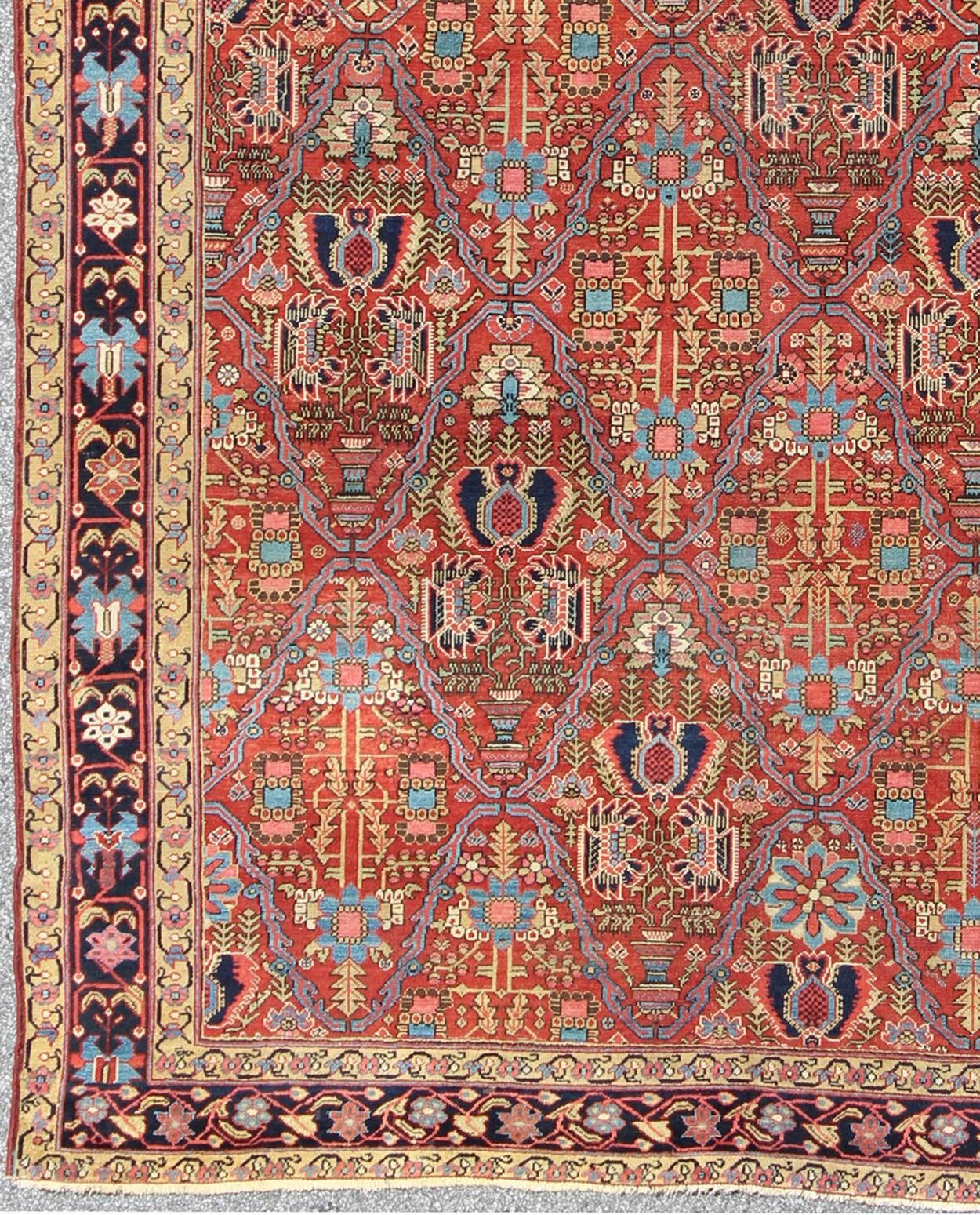 Measures: 7'6 x 11'2.
The richly colored and intricate design of this handwoven, antique 19th century Malayer rug distinguishes it from all others of its kind. The iconic all-over design consists of a flower centered within a diamond and surrounded
