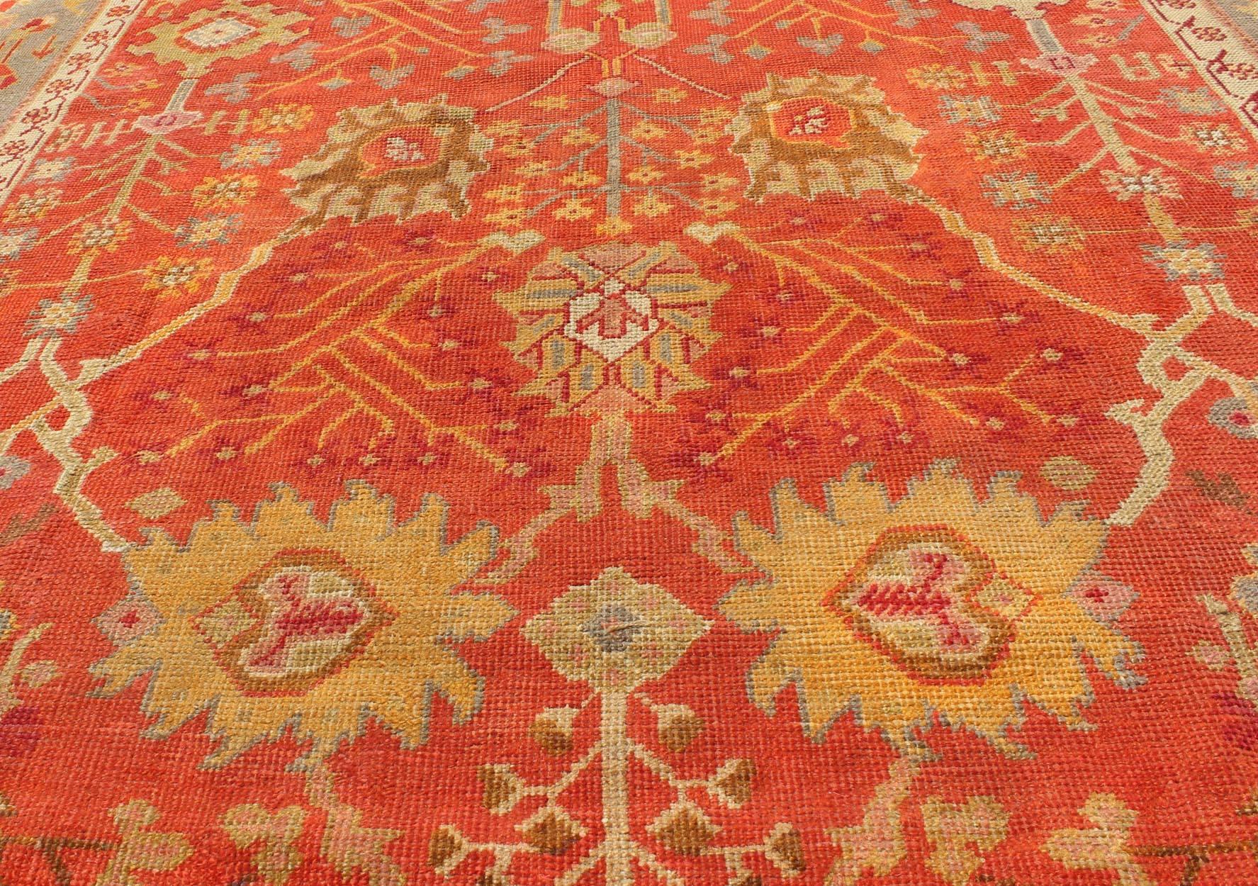 Wool  Antique Turkish Oushak Rug With All-Over Design On Orange Red Gray Border For Sale