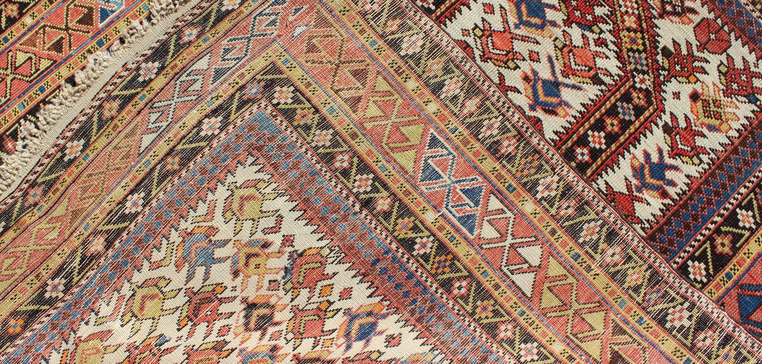 Antique Caucasian Shirvan Rug in Ivory Background, Rust, Yellow, and Dark Brown In Good Condition For Sale In Atlanta, GA