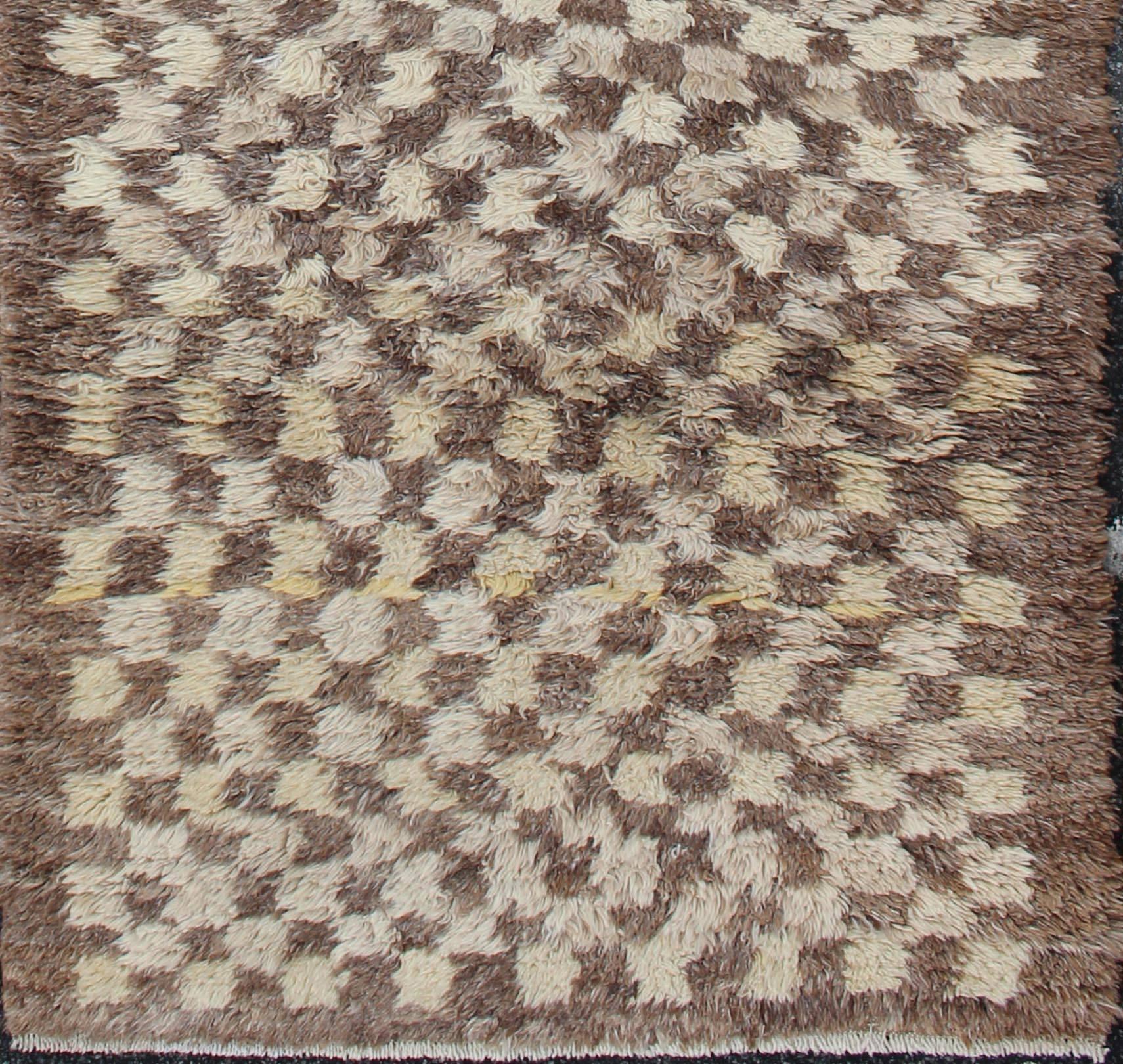 Vintage Turkish Tulu Rug with Shaggy Pile & Checkerboard Pattern.
This Turkish Tulu rug from mid-20th century is a naturally-dyed wool has high shaggy pile with checkerboard pattern.
Measures: 2'9 x 8'1.