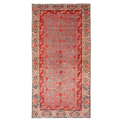Intricate Vintage Khotan Rug with Sub-Geometric Design in Reds and Light Blue