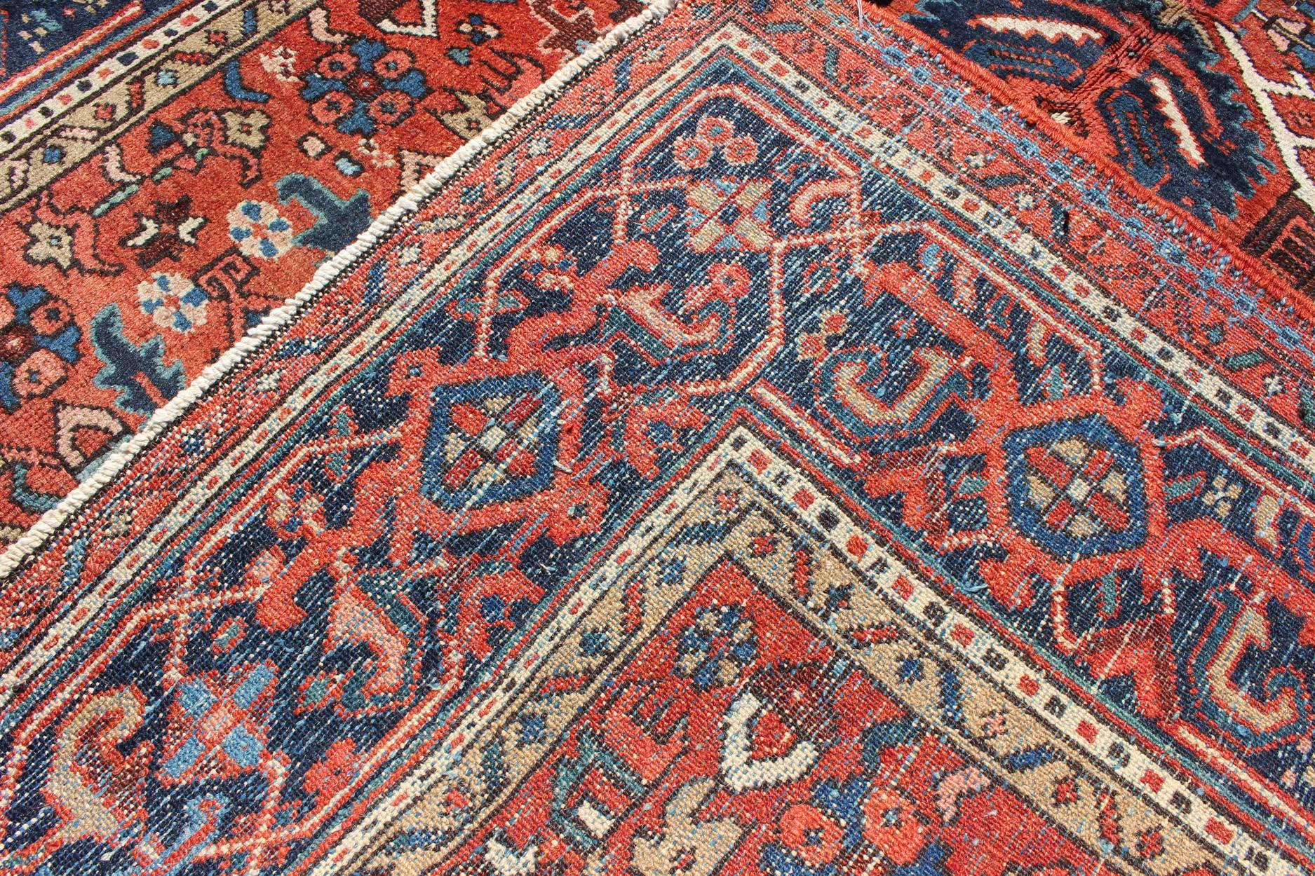 Early 20th Century Antique Persian Karajeh Rug with Three Geometric Medallions in Rust & Blue For Sale