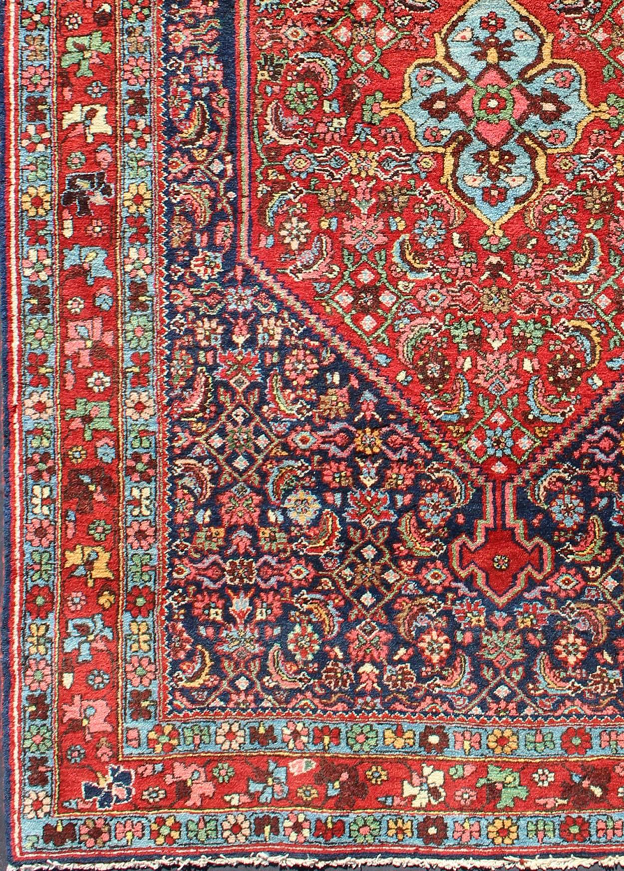 Beautiful Antique Geometric Bidjar With Diamond Medallion and Blue Background and Red border, rug/B-0508, type/ Persian.
This beautiful small rug features a Classic Bidjar format characterized by a navy blue, diamond-shaped medallion set on a red
