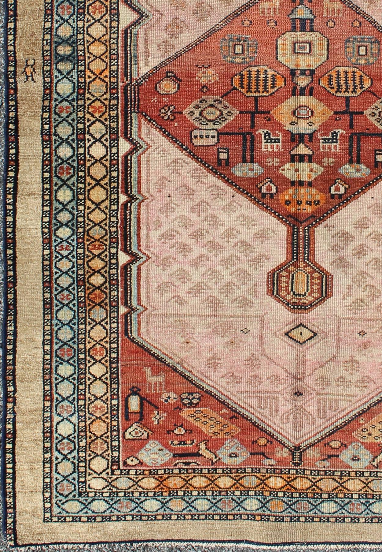 Serab antique rung from Persia with geometric medallions and ornate multi-tiered border, Keivan Woven Arts / rug H8-1001, country of origin / type: Iran / Serab, circa 1890.

This antique Serab carpet from late 19th century Persia features a