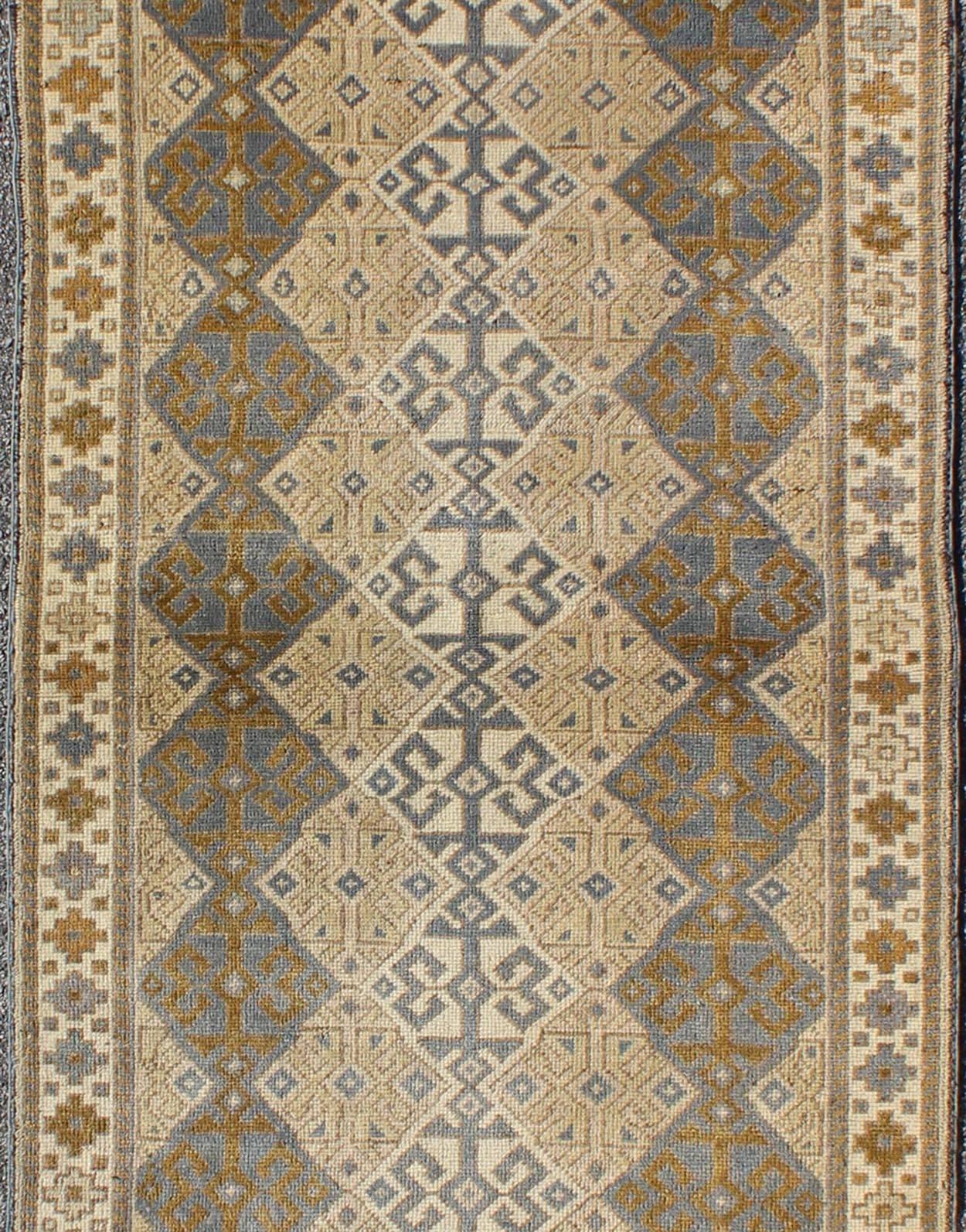 Hand-Knotted Antique Turkish Oushak Runner with Symmetrical Geometric Design For Sale