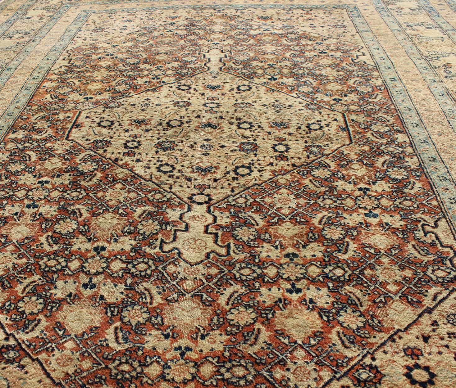 Wool Antique Persian Tabriz Haj Jalili Fine Rug in Earth tones, Red Brown Background For Sale