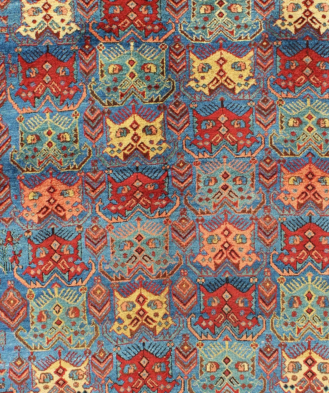 Bakshaish Antique Persian Afshar Rug in Blue Background, Terracotta Red Border & Lt. Green For Sale