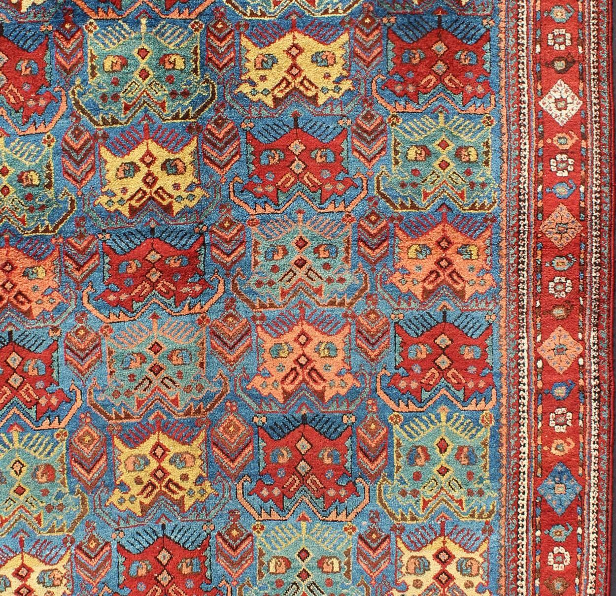 Hand-Knotted Antique Persian Afshar Rug in Blue Background, Terracotta Red Border & Lt. Green For Sale