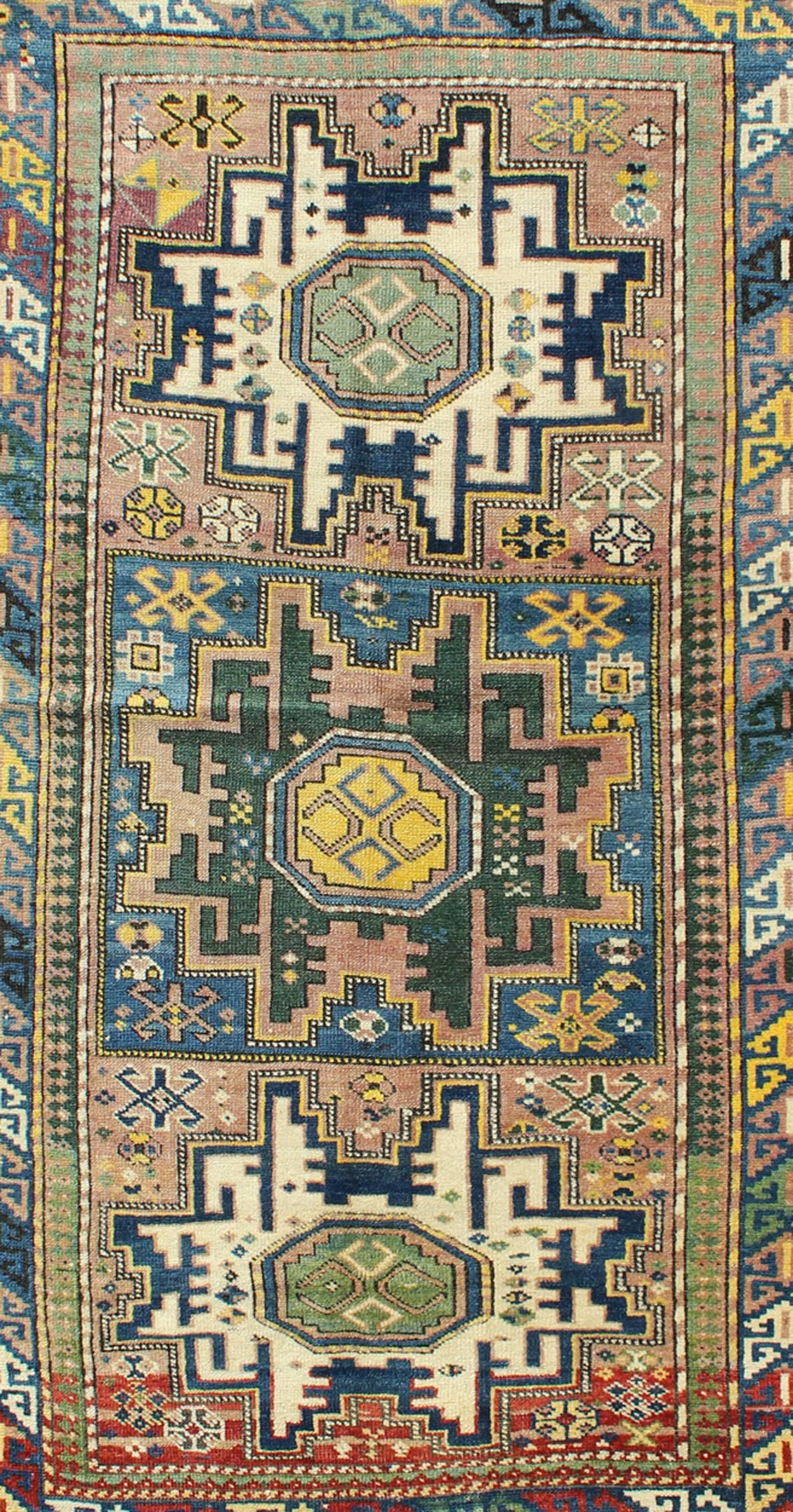 Kazak Antique Colorful Kuba Caucasian Rug with Star Medallions in Green, Blue, Yellow For Sale