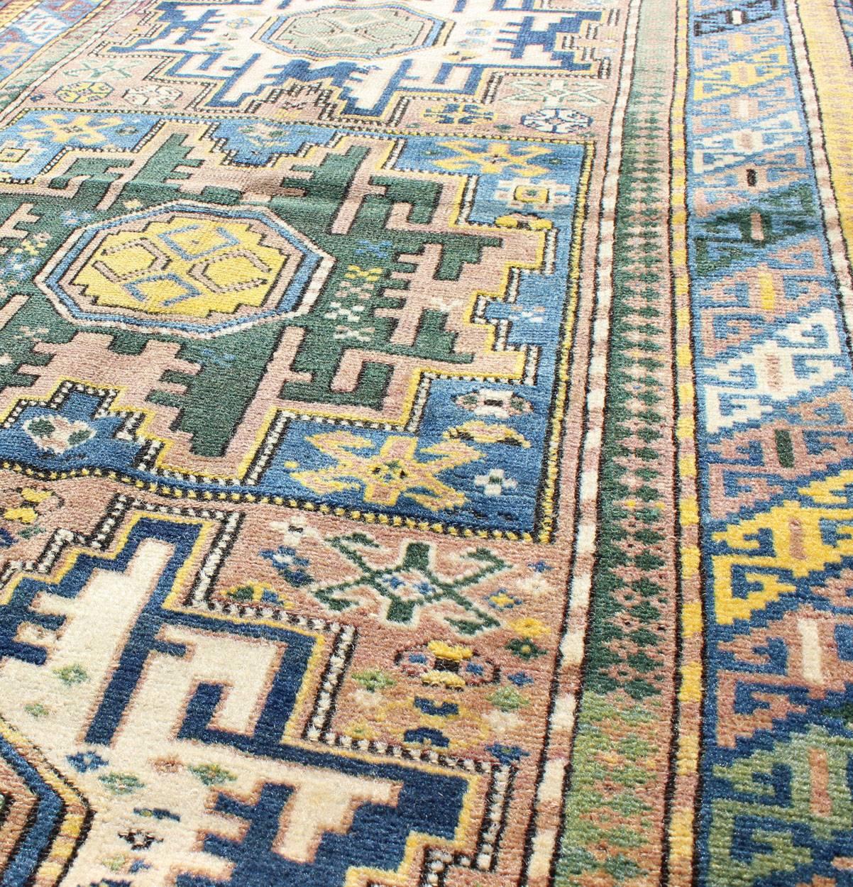 Antique Colorful Kuba Caucasian Rug with Star Medallions in Green, Blue, Yellow In Good Condition For Sale In Atlanta, GA