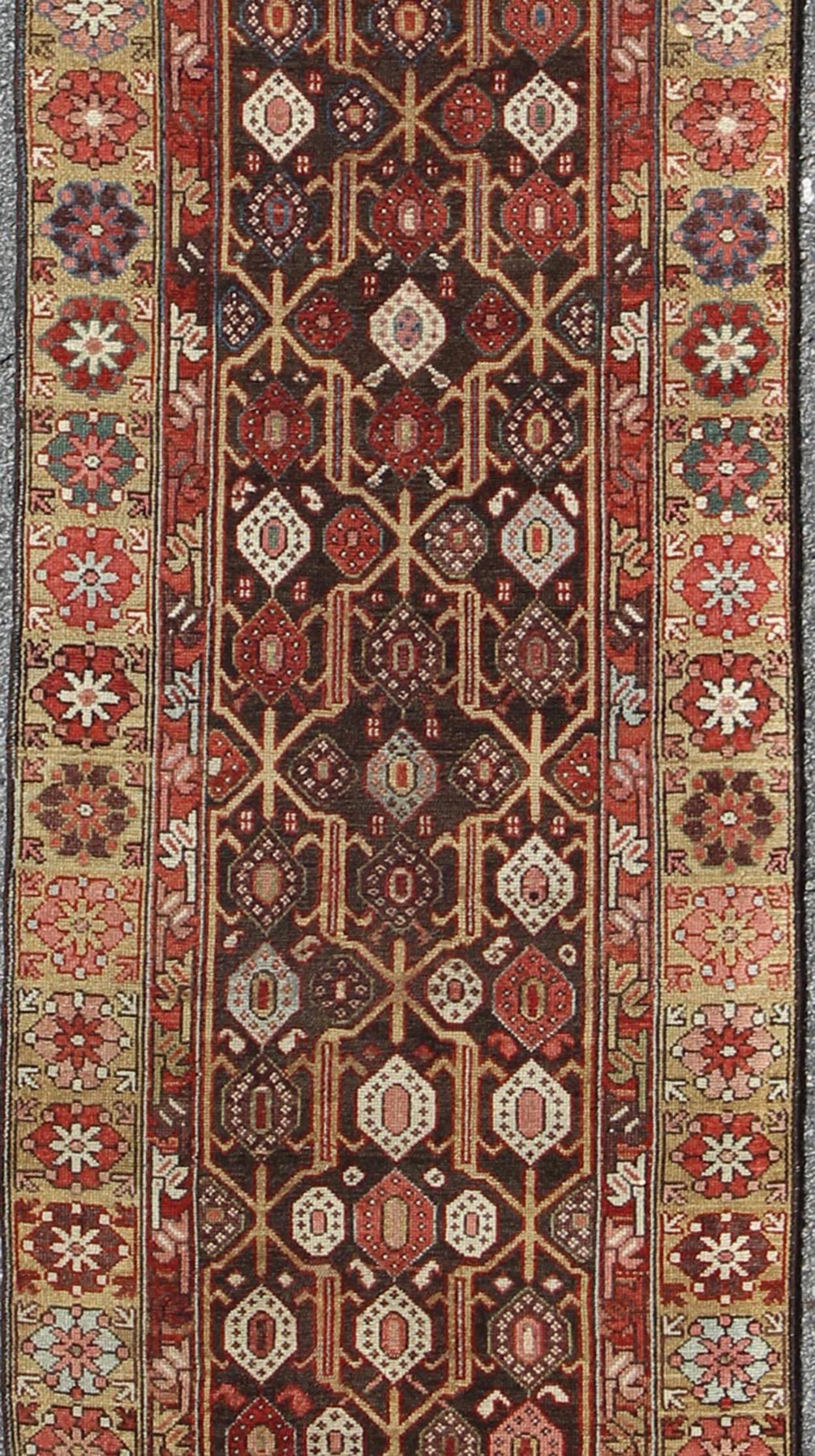 Tribal Antique Hand Knotted Kurdish Runner with All-Over Geometric Design For Sale
