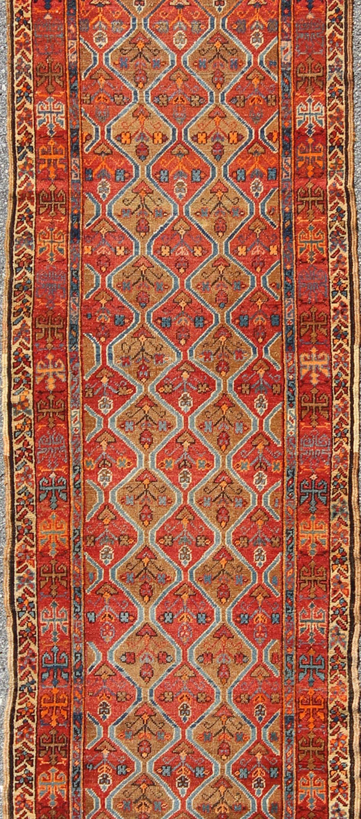 Persian Antique Serapi Runner with All-Over, Multicolor Geometric Design For Sale