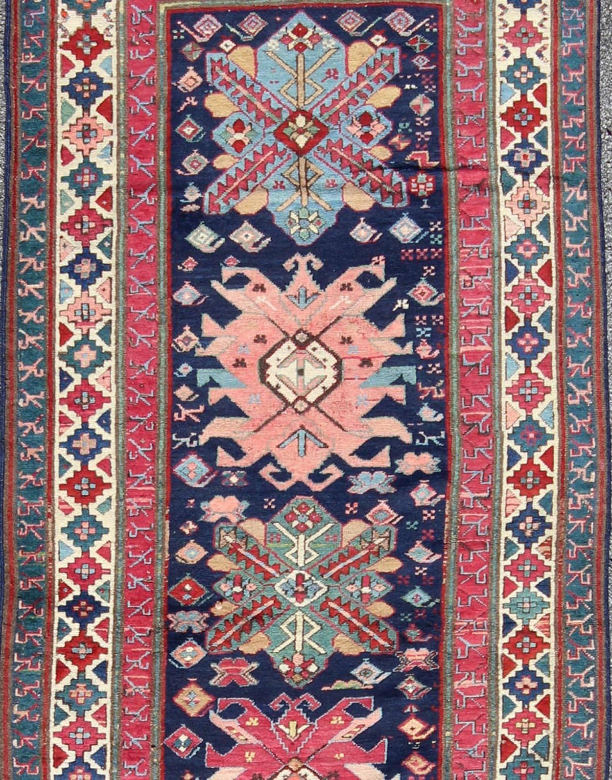Hand-Knotted Antique Late 19th Century Kazak Caucasian Runner in Navy Blue Background For Sale