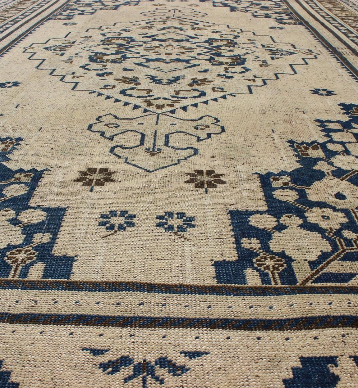 Mid-20th Century Vintage Turkish Oushak Rug with Denim Blue, Brown and Cream Colors For Sale