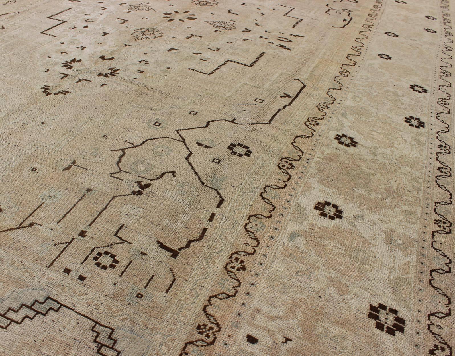 Mid-20th Century Vintage Turkish Rug in Neutral Tones in Taupe and Brown Highlights For Sale