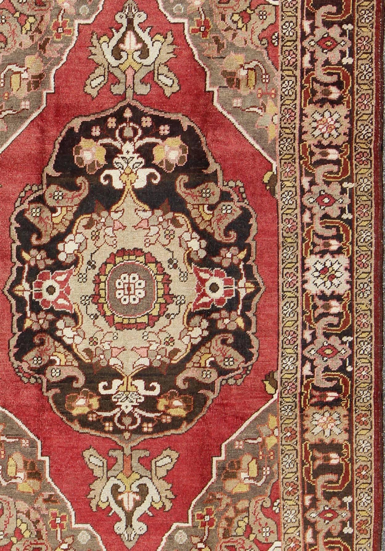 Mid-20th Century Turkish Antique Oushak with Scroll-Flower Pattern in Brown, Red, Light Green For Sale