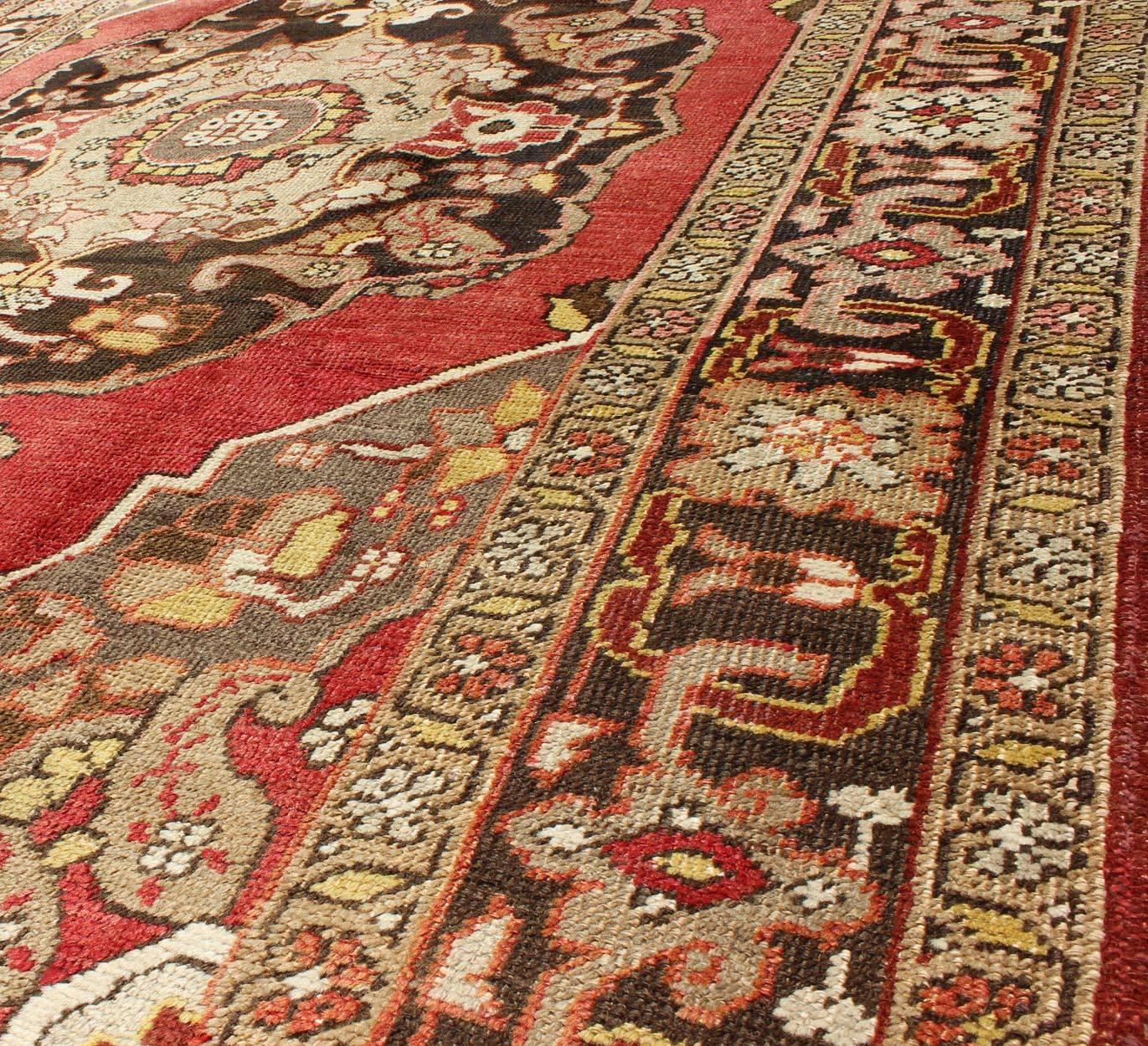 Wool Turkish Antique Oushak with Scroll-Flower Pattern in Brown, Red, Light Green For Sale
