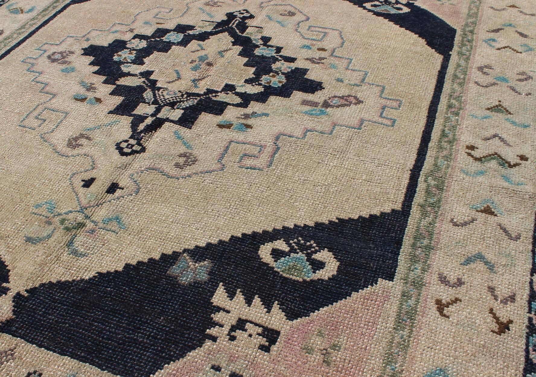20th Century Vintage Hand Knotted Turkish Oushak Rug with Central Medallion in Cream and Blue For Sale