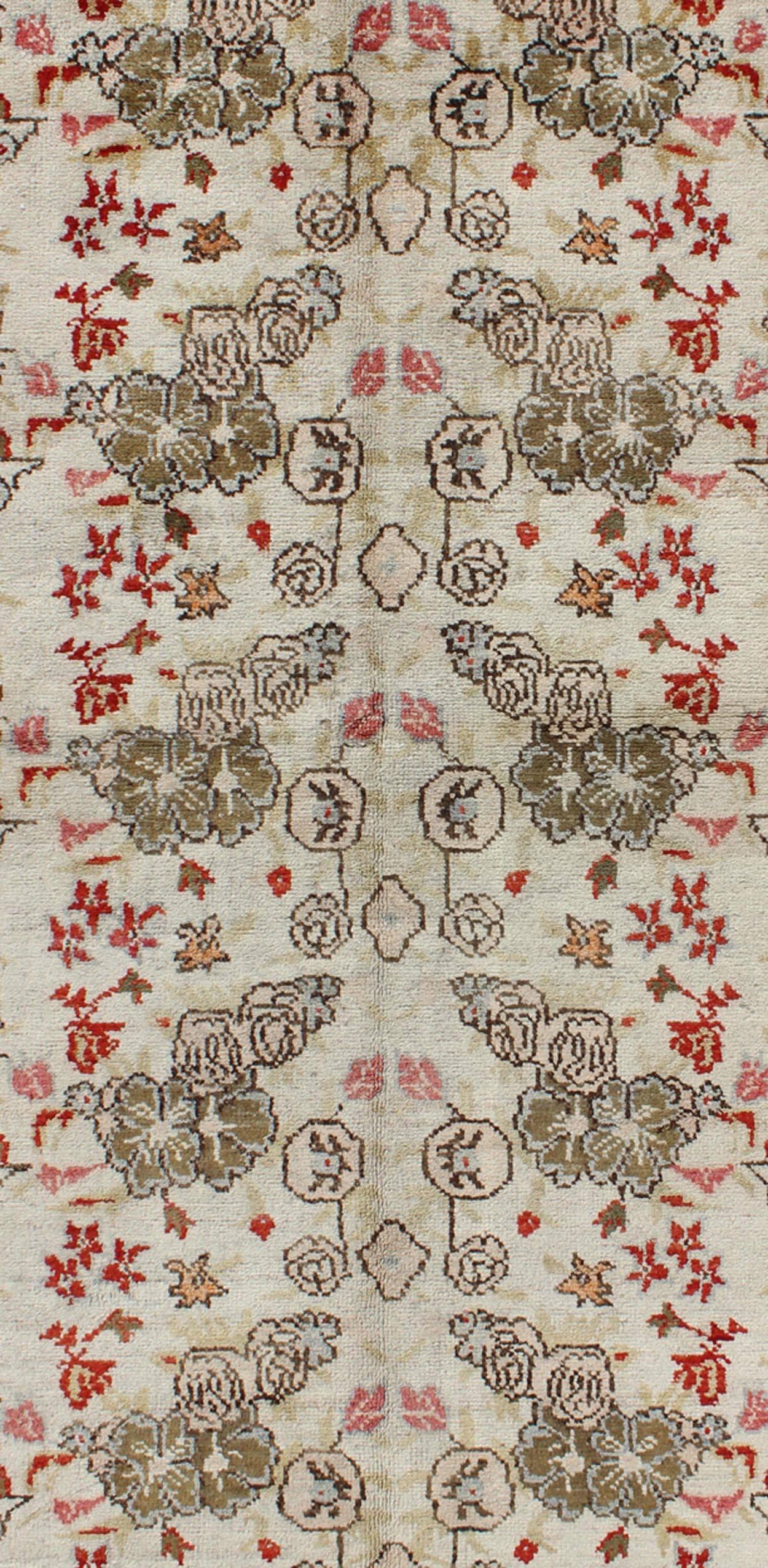 Hand-Knotted Vintage Turkish Oushak Rug with all over Floral Design in Ivory, Green and Red For Sale