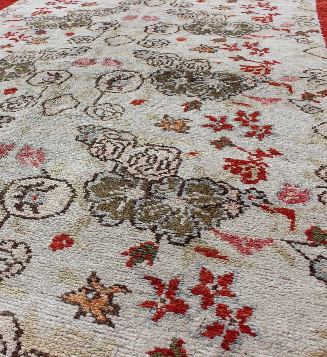 20th Century Vintage Turkish Oushak Rug with all over Floral Design in Ivory, Green and Red For Sale