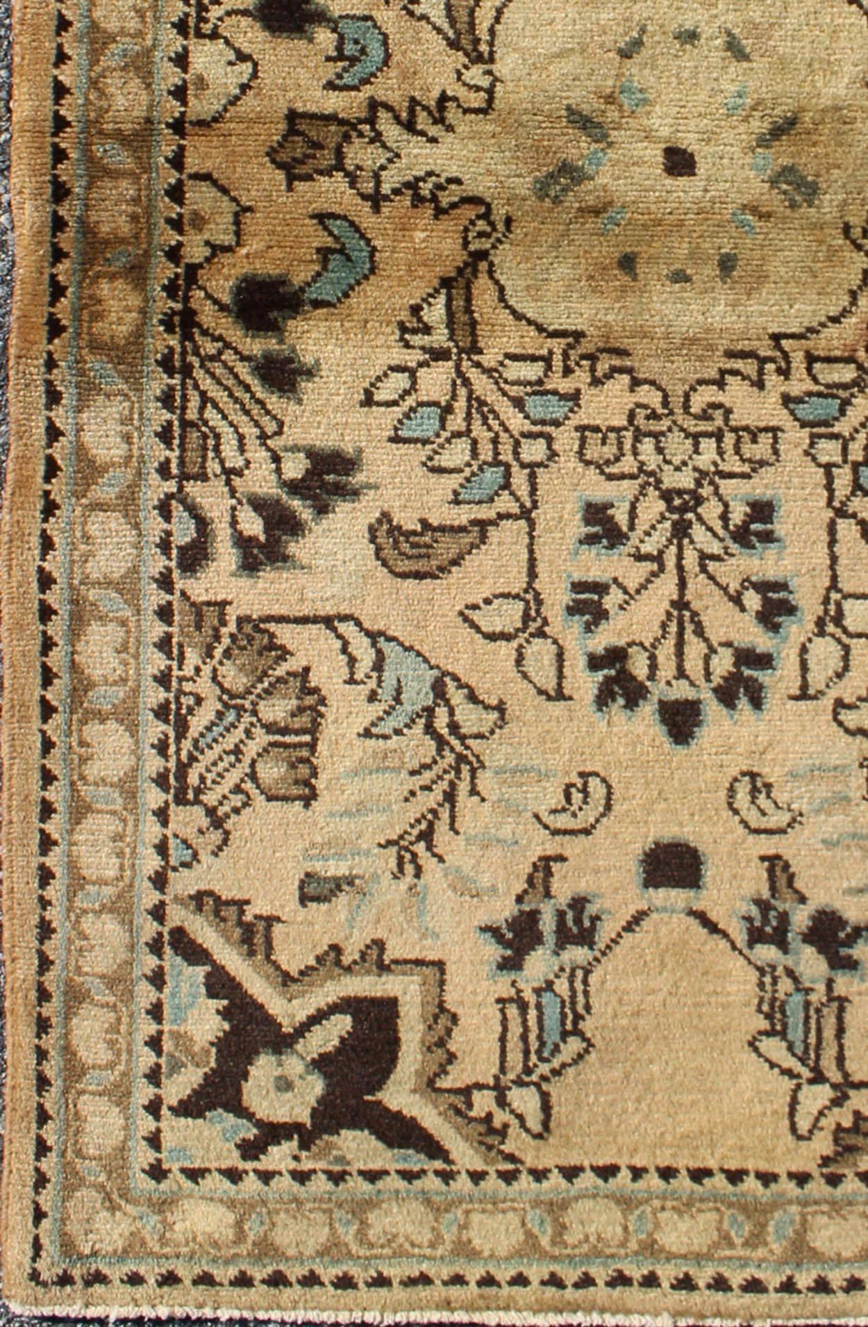 This vintage Persian Tabriz rug features a center medallion design in a neutral color palette with brown outlines. 
Measures: 2'5 x 4'3.