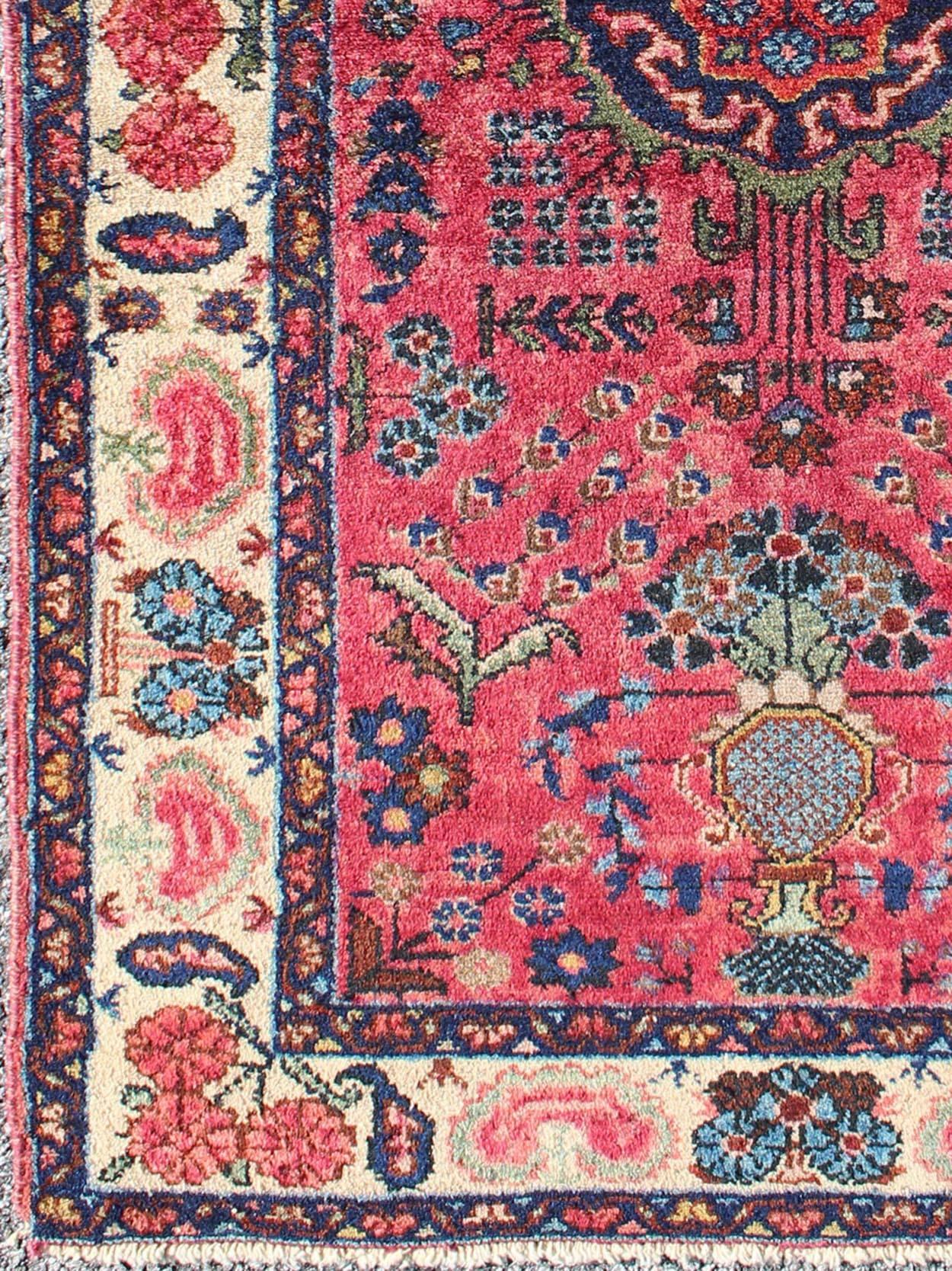 This antique Persian rug features a large-scale, multicolored floral design complemented by a centre medallion.
Measures: 2.7 x 4.3.