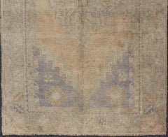 Vintage Turkish Oushak Rug with Muted Colors and Central Medallion Design