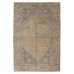 Vintage Turkish Oushak Rug with Muted Colors and Central Medallion Design