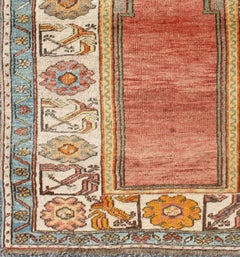 Antique Turkish Prayer Rug in Turquoise, Salmon, Orange, Blue and Ivory