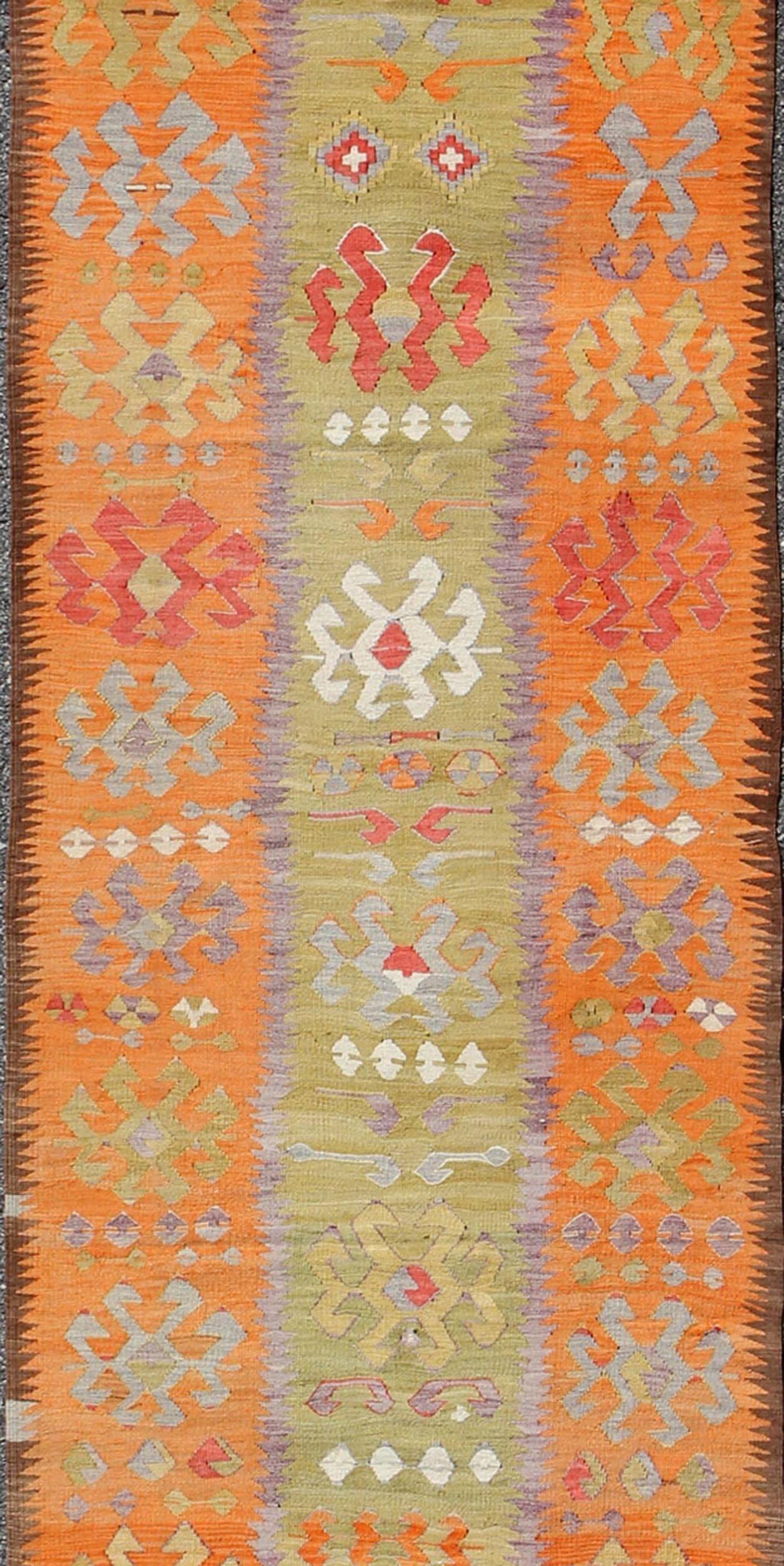 Long Kilim Runner with Tribal Design in Citron Green, Red and Orange In Excellent Condition In Atlanta, GA