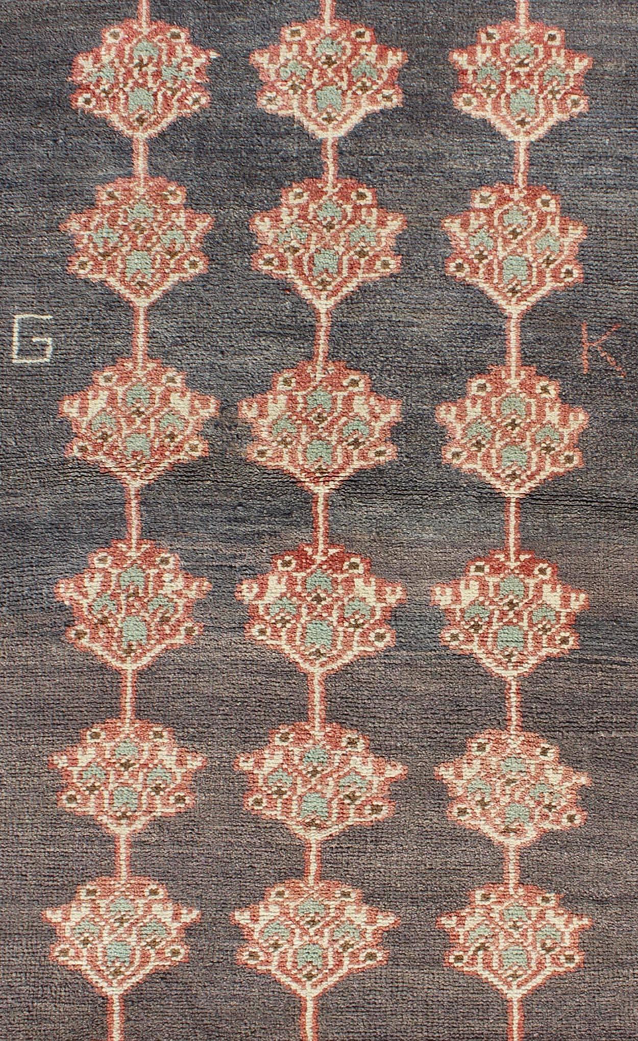 Hand-Knotted Vintage Turkish Tulu Carpet with Three Rows of Flowers on Gray & Charcoal Field For Sale