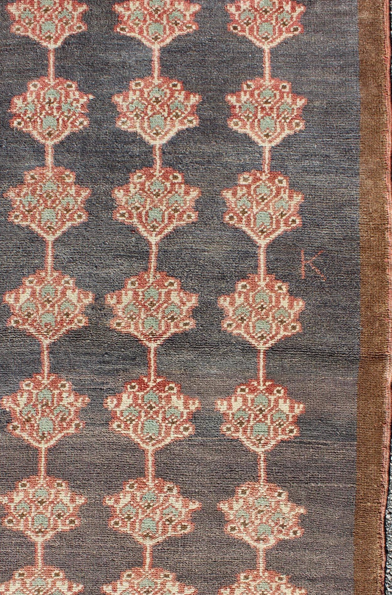 Vintage Turkish Tulu Carpet with Three Rows of Flowers on Gray & Charcoal Field In Excellent Condition For Sale In Atlanta, GA