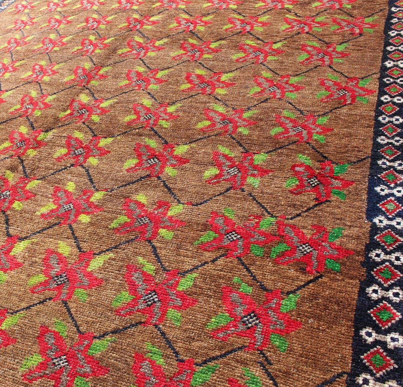 20th Century Turkish Oushak Carpet with Poinsettia Design With A Light Brown Background For Sale
