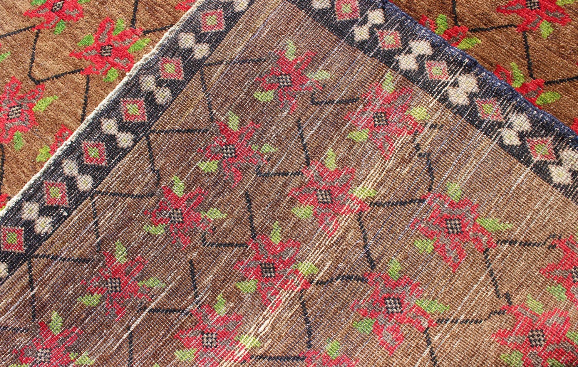 Turkish Oushak  with Poinsettia Design Set Atop Light Brown Background For Sale 1