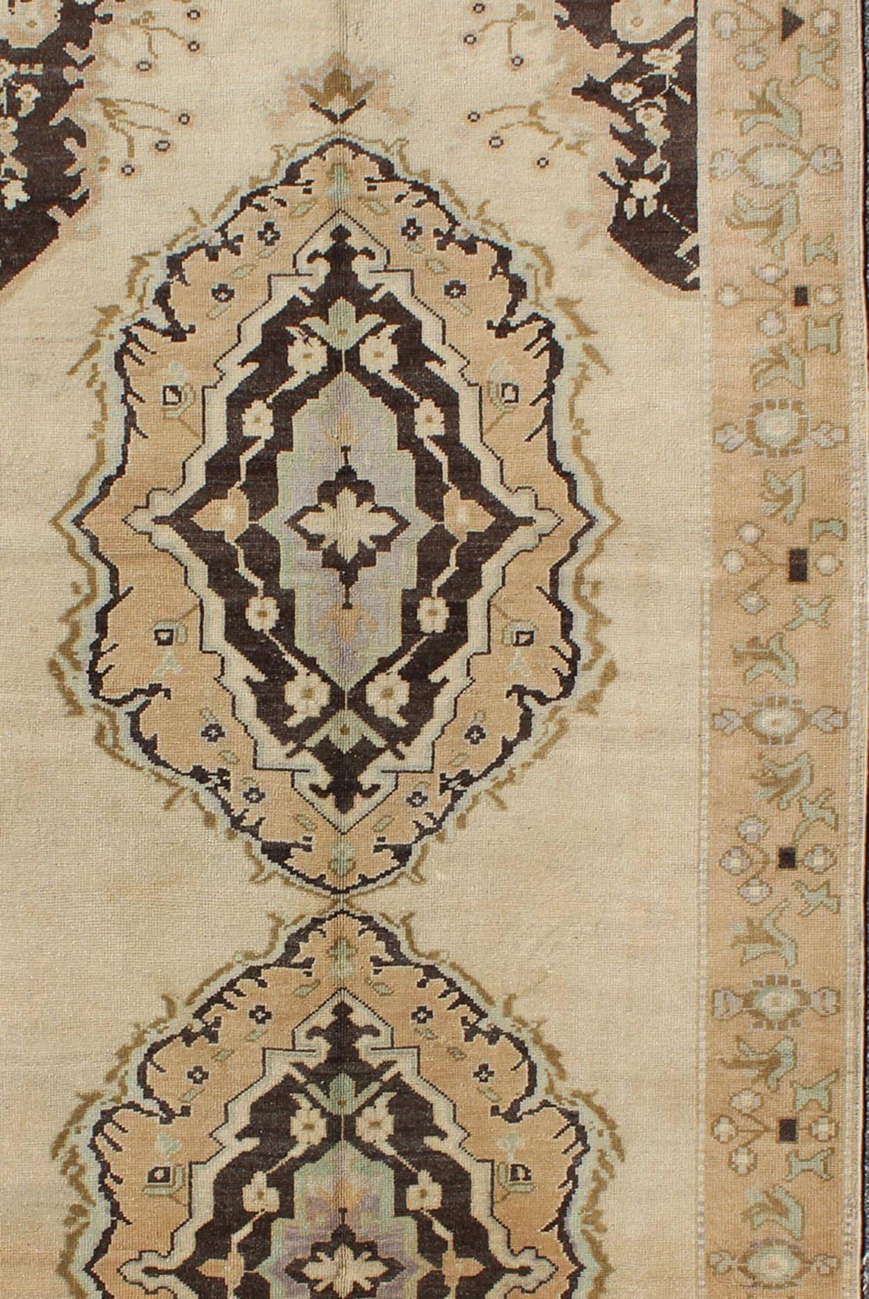 Mid-20th Century Vintage Turkish Oushak Gallery Rug with Two Medallions in Taupe, Brown and Cream For Sale
