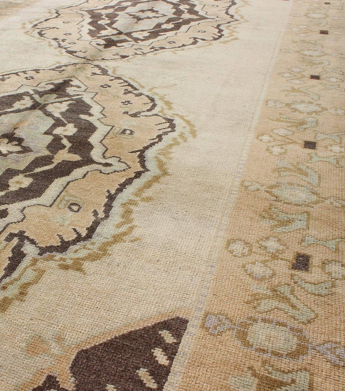 Wool Vintage Turkish Oushak Gallery Rug with Two Medallions in Taupe, Brown and Cream For Sale