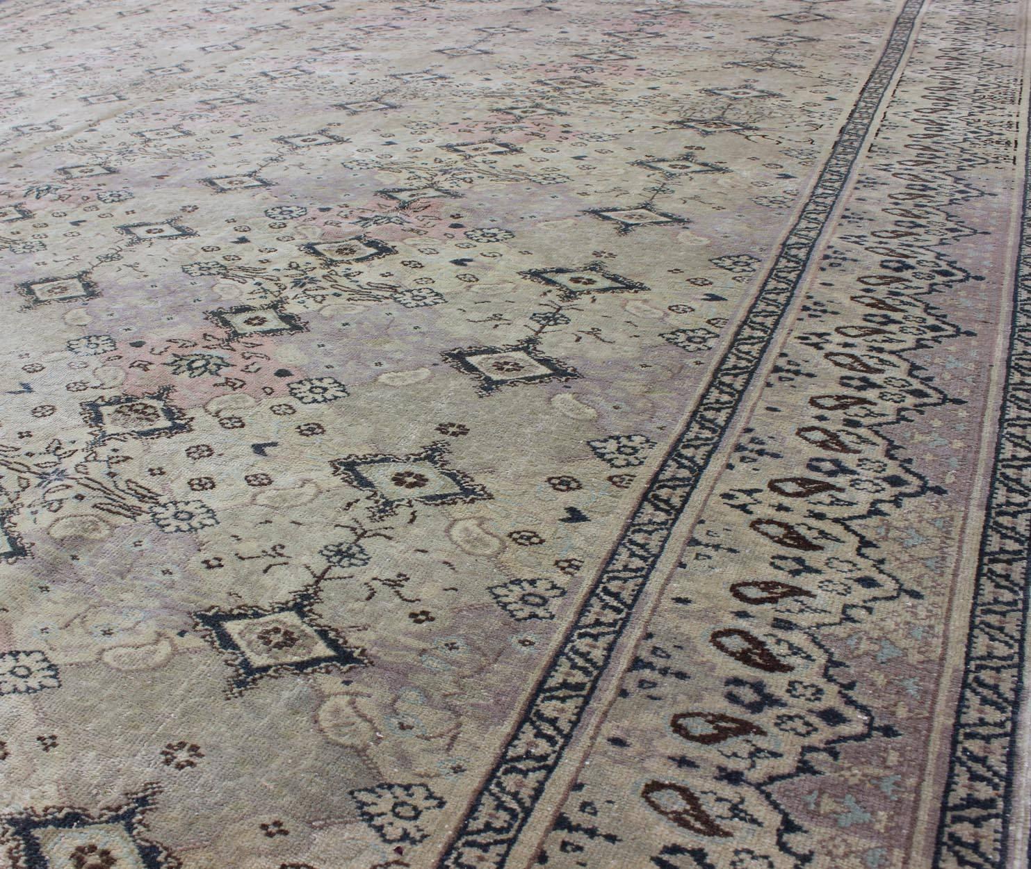Large Turkish Sivas Rug with Repeating Diamond Motifs Set on Ivory Ground In Excellent Condition For Sale In Atlanta, GA