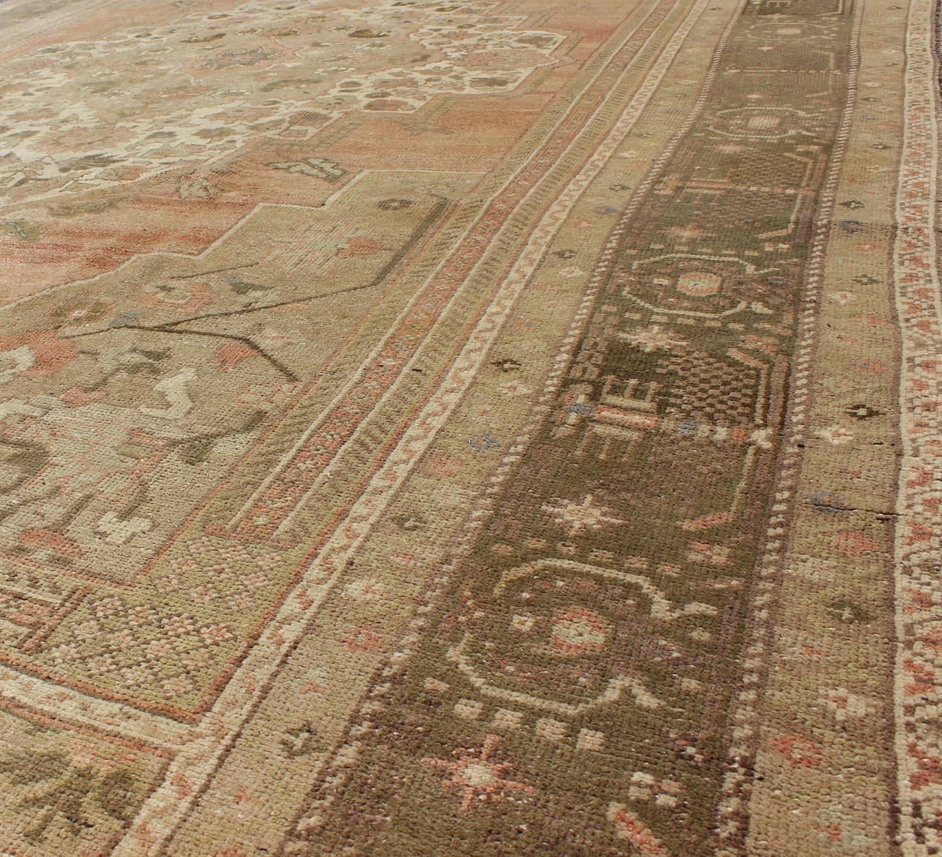 Vintage Turkish Oushak Carpet with Faint Salmon Field and Elegant Floral Motifs In Excellent Condition For Sale In Atlanta, GA
